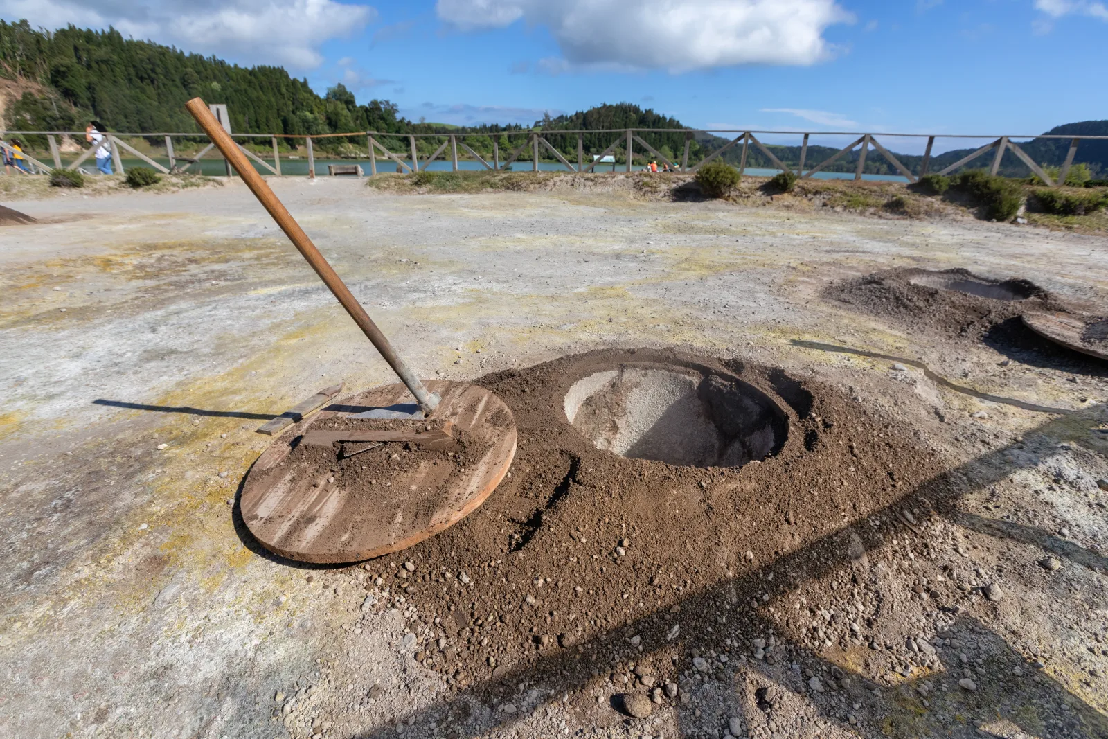 Steaming geothermal hole at Furnas Lake where cozido das Furnas is buried and cooked underground, Azores