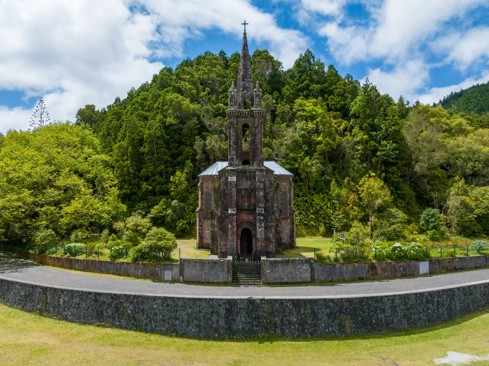 Aerial view of Capela de Nossa Senhora das Vitórias on Furnas Lake — São Miguel, Azores