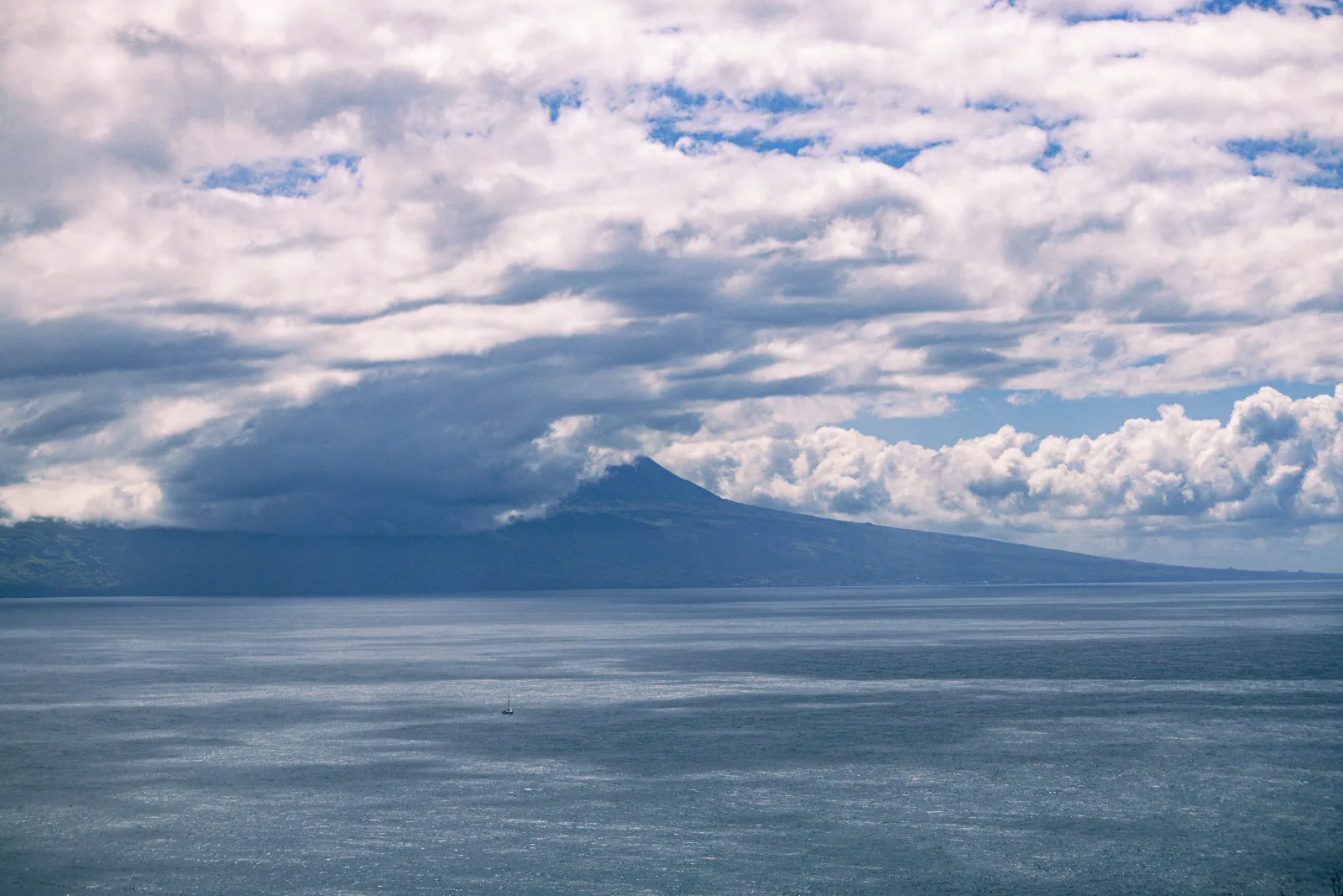 Pico Mountain rising through the clouds — Portugal's highest peak, in the central Azores, Atlantic Ocean