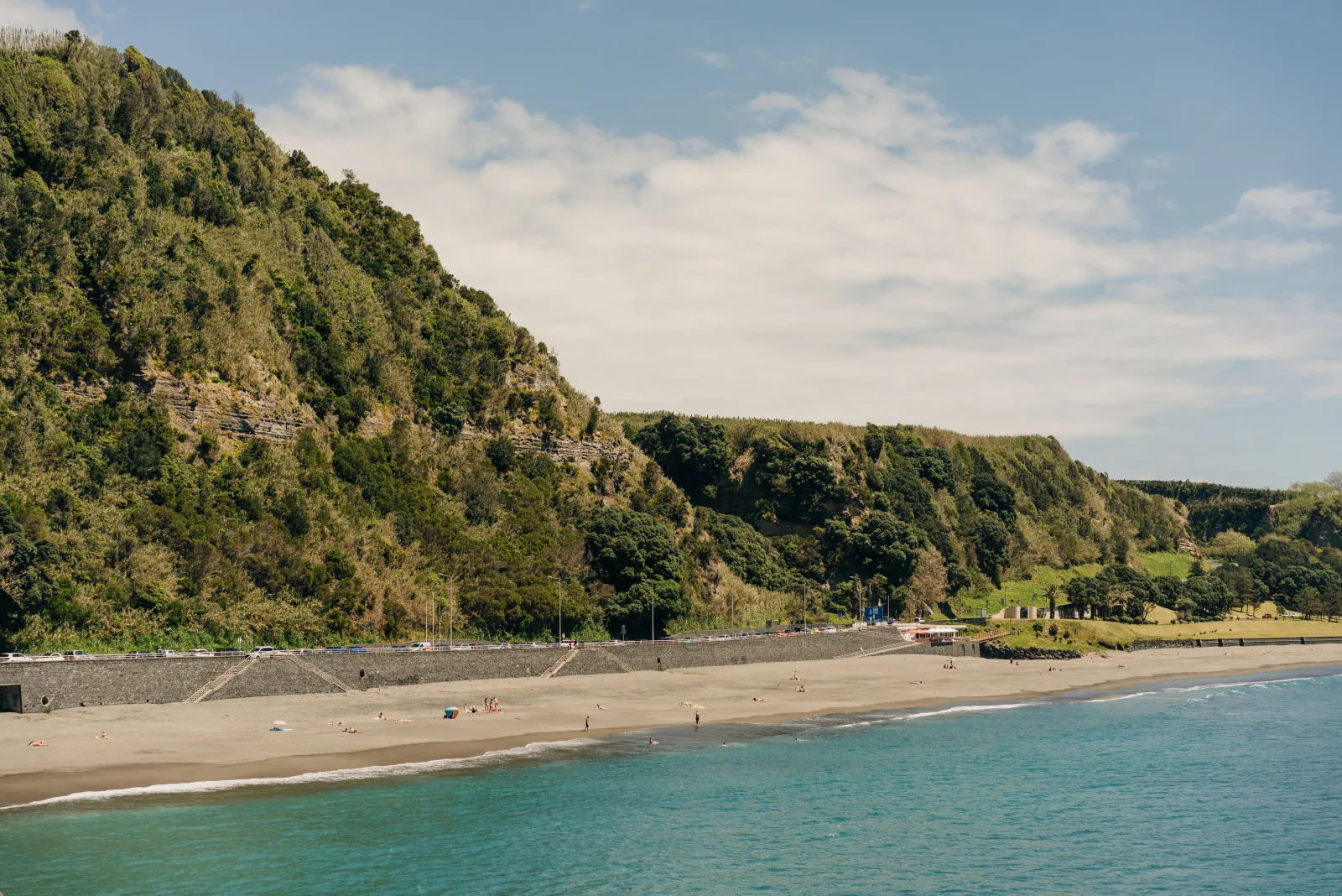 Praia de Água d'Alto beach on São Miguel in summer — calm Atlantic water and clear skies, the Azores in July, Portugal