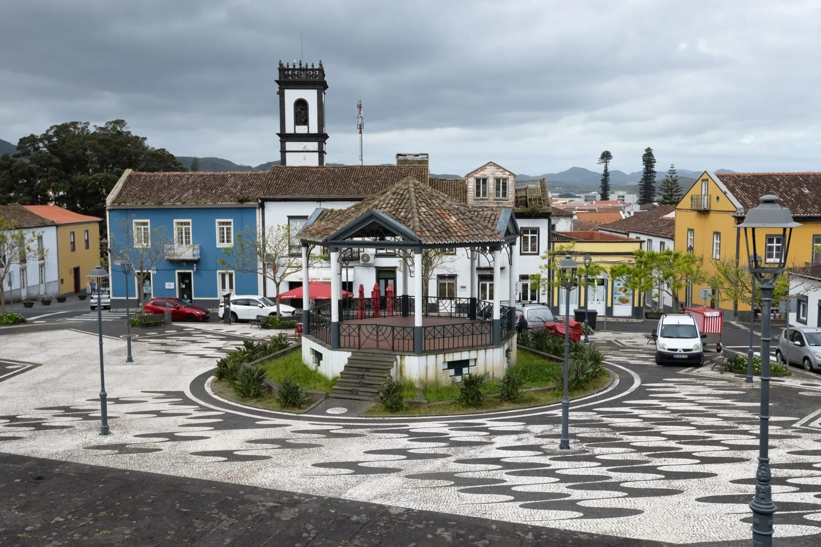 The historic centre of Ribeira Grande with its church towers and traditional architecture against the green hills of northern São Miguel, Azores