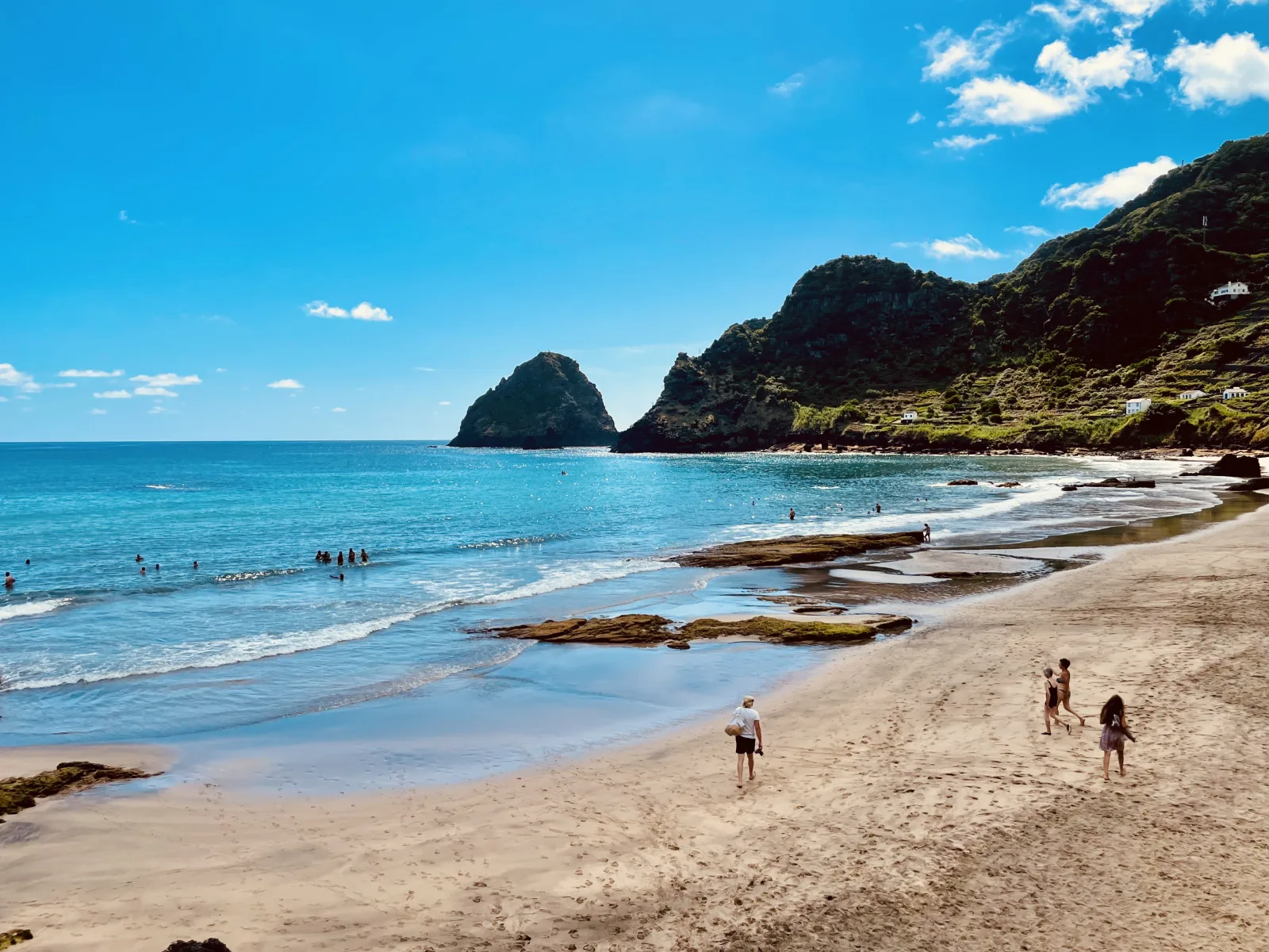A sandy beach on Santa Maria island in the sun — the white-sand coastline that earns the island its 'Algarve of the Azores' nickname, Portugal