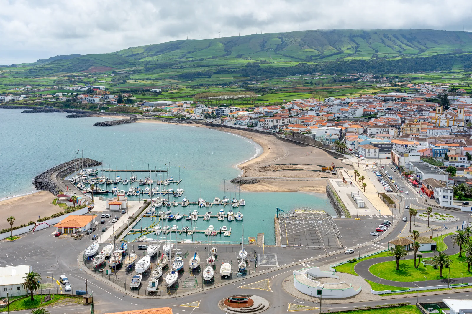Aerial view of the Praia da Vitória marina and bay on Terceira Island — the eastern coast harbour and sand beach, Azores, Portugal
