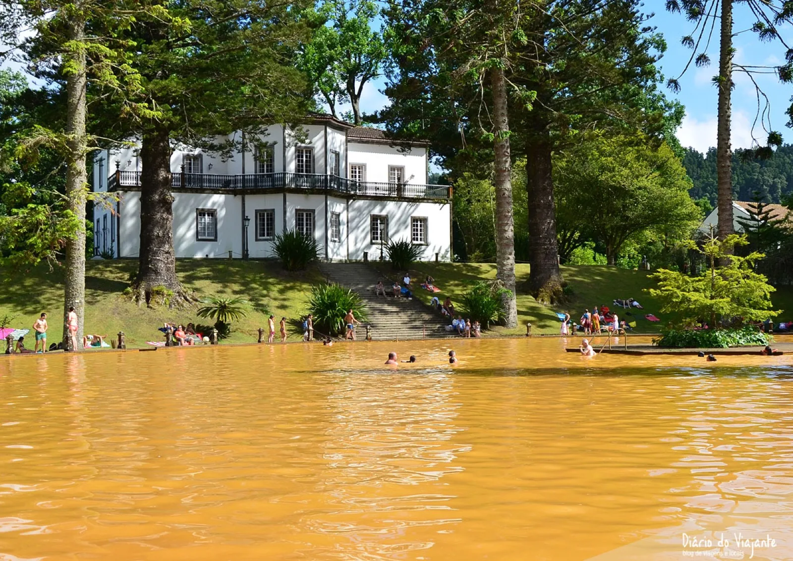 Terra Nostra Park in Furnas, São Miguel — historic botanical garden surrounding the iron-rich brown thermal pool